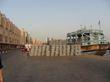 Dubai Creek Cargo freight boats along the dockside and cargo to be loaded