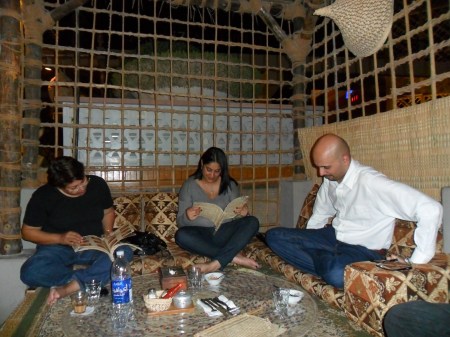 three people, majlis seating