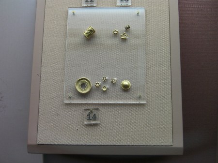 tiny gold buttons and beads