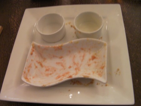 empty dishes in the shape of a face
