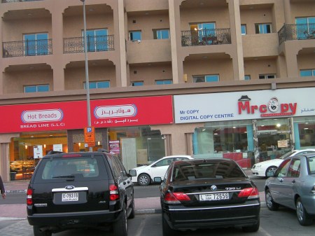business signs for Hot Bread bakery and Mr Copy