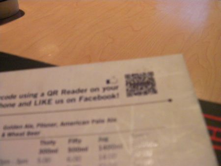 qr code in the corner of a restaurant menu