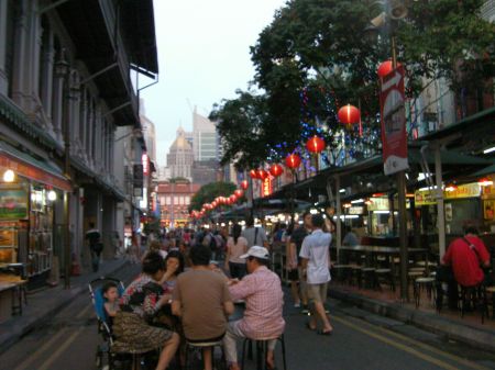 food road in Singapore Chinatown lined with restaurants and food booths