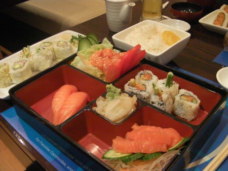 Salmon Lovers Bento salmon nigiri, salad, maki, and sashimi