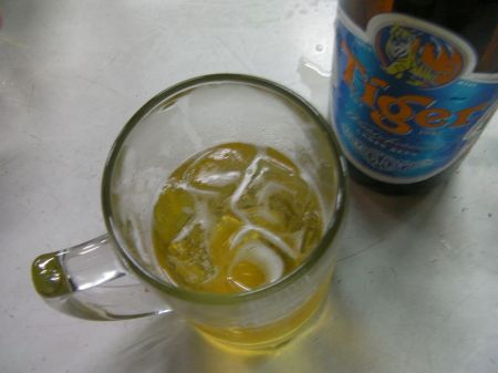 mug of beer with ice in it