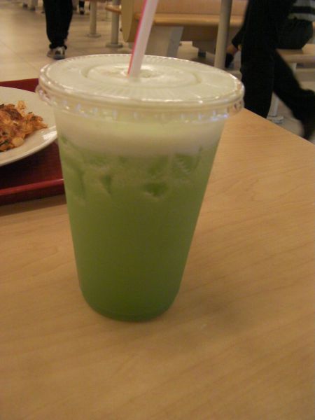 cup of bright green juice