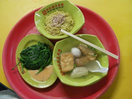 soup with noodles and greens