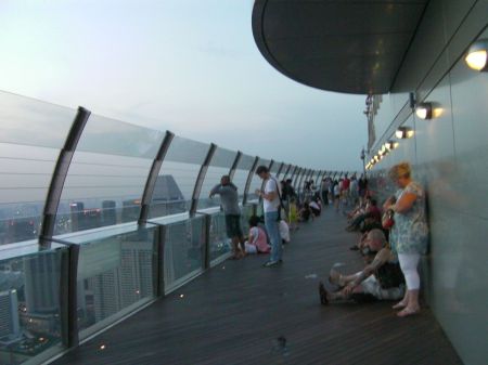 tourists sitting on the observation deck