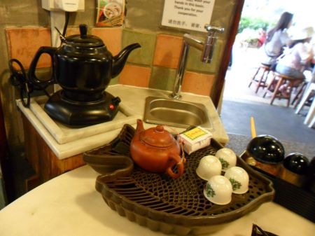 tea kettle, sink, tea pot and tiny cups
