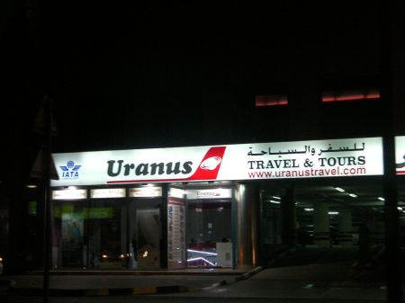 Uranus travel and tours business sign