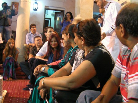 Our Group people seated on cushions