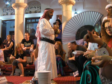 Bedouin bedouin man serving coffee