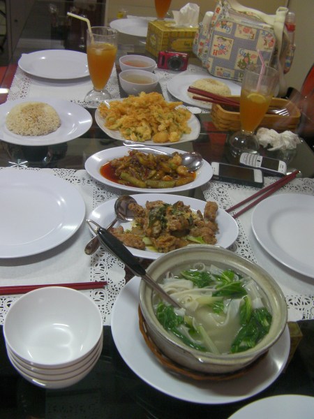 Oriental Restaurant table full of dishes and food