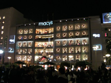 five story building with wreaths in every window