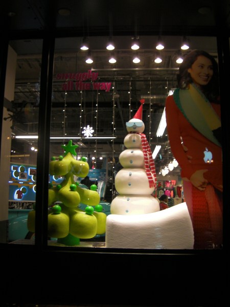 snow man and Christmas tree window display
