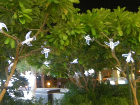 light decorations of birds in the trees