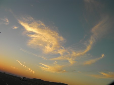 wispy clouds that look like wings