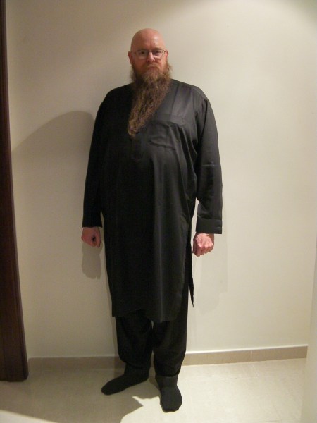man in black shirt and trousers