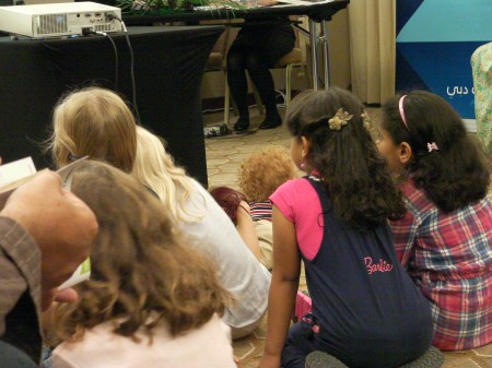 young children sitting on the floor