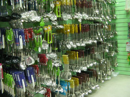 wall covered with serving spoons