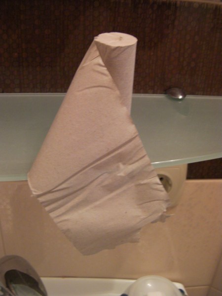 brown toilet paper rolled tightly with no cardboard center