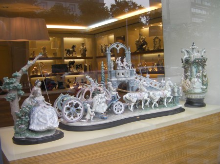 porcelain figures, a horse drawn carriage