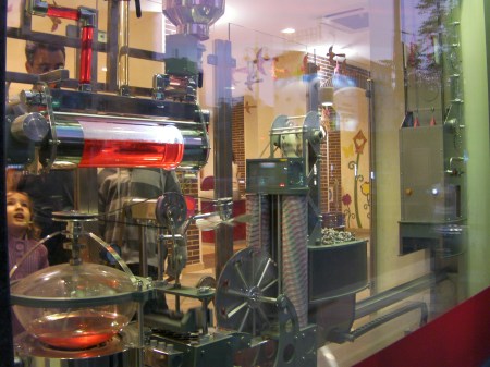 mechanical candy making machine in the store window