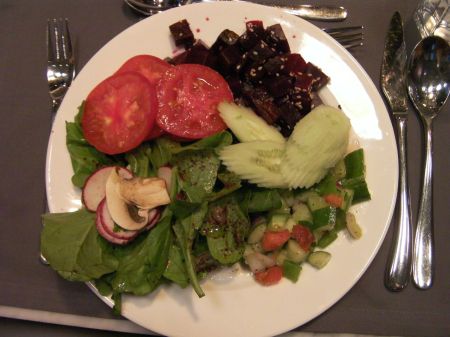 plate of tomatoes, cucumbers, beets, green salads