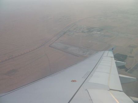 view of desert as plane is landing