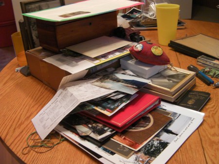 pile of photos and other keepsakes