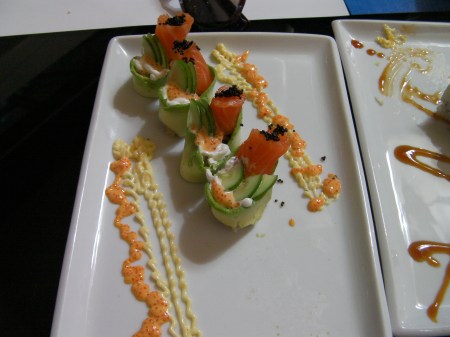 sushi roll of salmon and cucumber