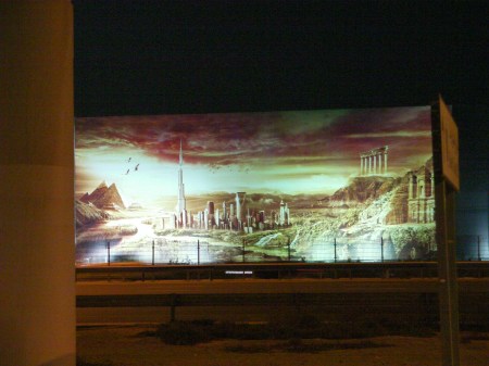 billboard showing random iconic sites