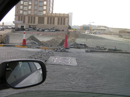 trench dug between buildings