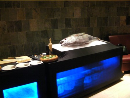 serving station with a large fish on it
