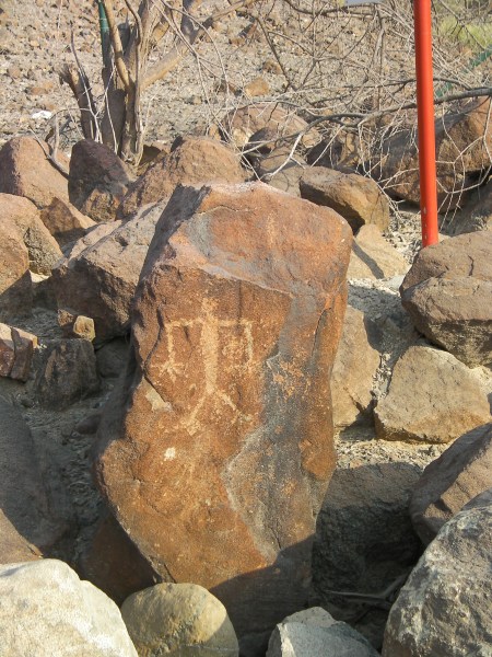 image of a man carved into rock