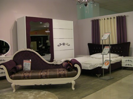 dark purple lounge chair and bedroom furniture