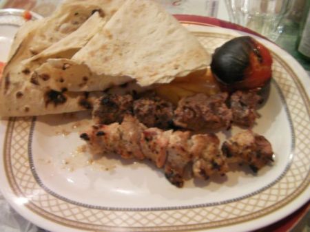 grilled chicken and beef with flat bread 