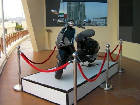 black vespa on display