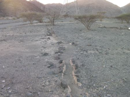 ancient water channel used for watering a date palm garden