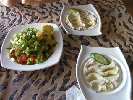 green salad, hummous, mutabel
