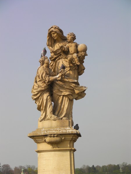 statue of a woman with two children