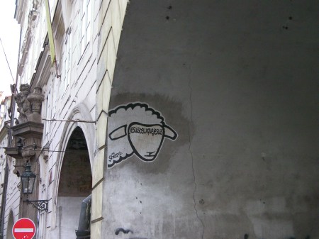 graffiti on an archway showing a sheep's head