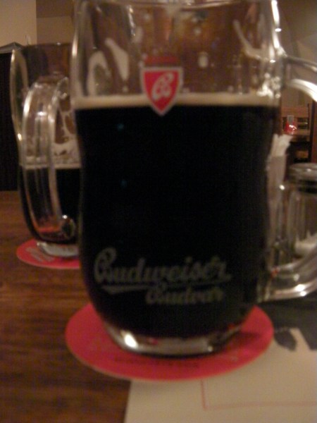 stein of extremely dark Budweiser beer