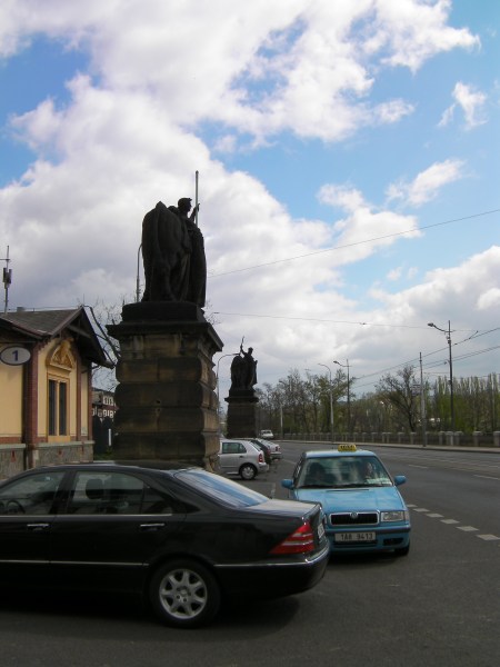 two statues one of a woman with a bull and one of a man with a bull