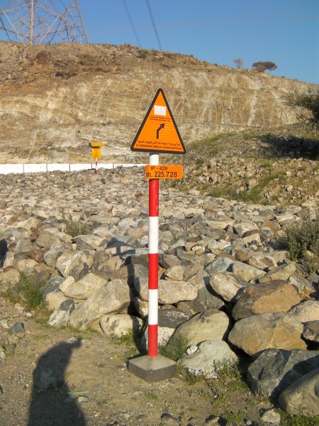buried pipeline and warning sign
