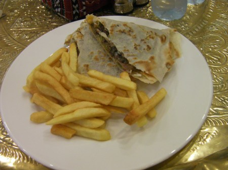 lamb in paper thin flat bread with fries