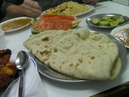 flat bread, chicken, tomato, cucumber, rice