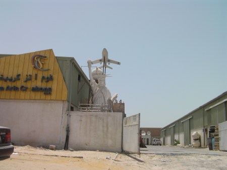 industrial area with foam sculptures including the statue of liberty
