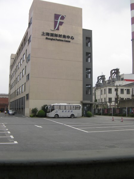 tall building labeled Shanghai Fashion Centre