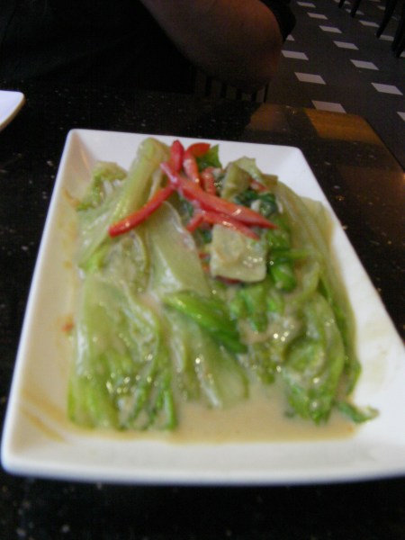 cooked lettuce in a sauce